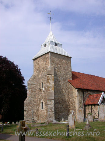 , North%Shoebury Church - This lower parts of the tower are C13, as is shown by the west 
windows. Later, the buttresses were added, and a two-step pyramid roof was 
added, the upper part broached.
