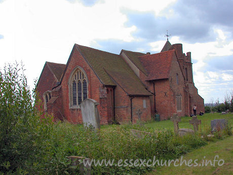 , East%Horndon Church - Here we see the church from the NE, with my fiancee, Julie, examining the exterior windows.