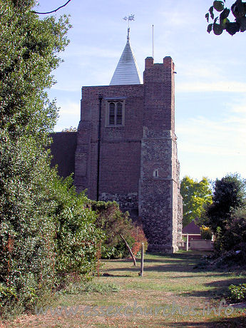 St Giles & All Saints, Orsett Church - The W tower occupies the westernmost bay of the N aisle. It is 
partly stone, and partly C17 brick. It has a large diagonal buttresses, and as 
can be seen in this picture, a bulky NW stair-turret. At the top it sports a 
white weather-boarded spire.

