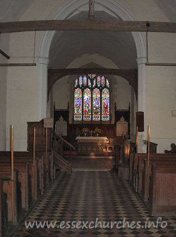 , Beauchamp%Roding Church - View from the nave into the chancel, showing the fairly high chancel arch.