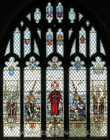 St Andrew, Hornchurch Church - 
	
		Image reproduced by kind 
	
	
		permission of Julie Archer.
	

From the church's own website
The E window replaces one destroyed by enemy action in the second world war and is dedicated to the memory of Thomas Mashiter. It shows the arms of the Dioceses of Rochester, London, Chelmsford and St Albans and those of the county of Essex and the Urban District of Hornchurch. From L to R this window shows: Edward the Confessor in front of Westminster Abbey holding in his left hand a ring, referring to the legend of Have-a-ring. Next St Andrew, in the centre Christ standing on the shores of a lake, next St Peter and on the extreme right William of Wykeham with New College Oxford in the background. The theme is "Follow me and I will make you fishers of men". The window was designed by Gerald Smith and made by the Nicholson Stained Glass Studio on 1954.