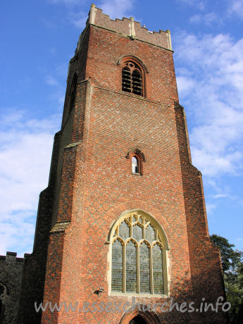 St Michael, Thorpe Le Soken Church - Note the two-light bell-openings, with the single circle as tracery. This is all executed in brick!
