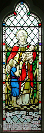 St Catherine, Wickford Church - This window depicts Mary and the baby Jesus. It is dedicated to Constance Burton, who was the wife of a Conservative MP from Sudbury, named Colonel H.W. Burton OBE.
The banner at the bottom of the window reads ...
"Her children arise up and call her blessed."
