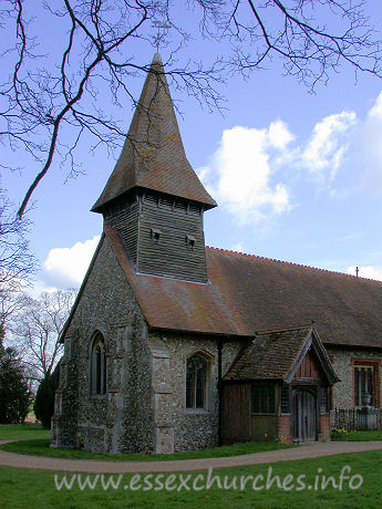 St Mary, Broxted Church - The belfry is weatherboarded, and stands on four posts.


