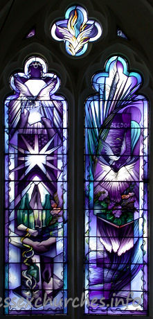 St Mary, Broxted Church - One of two two-light 'hostage' windows by John Clark. This 
window symbolises Freedom. It was put in in 1993 to commemorate the long cruel 
captivity and eventual release of journalist John McCarthy, an active churchman, 
whose home before his kidnapping was the big house next door.

