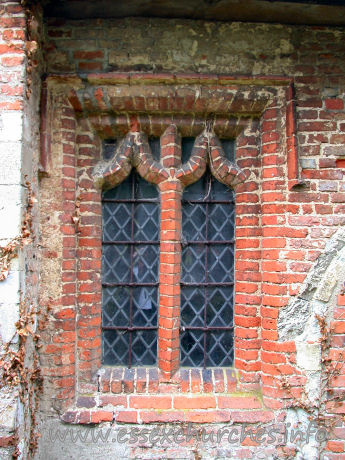 , Berners%Roding Church - 



An early C16 brick window in the S wall.



