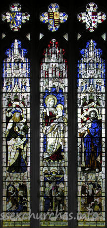 , Great%Bardfield Church - S chapel - easternmost window of S wall, showing the Incarnation
Shows the Blessed Virgin Mary with Isaiah and St John the Baptist.
The quatrefoils show Arms of the Diocese, Royal Arms and Lampet Arms quartered with Sparrow Arms.