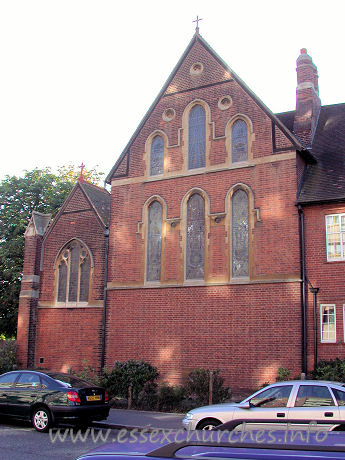 All Saints, Southend-on-Sea  Church - To be fair, the East end of the church would probably not look 
as plain as it does, if it was not immediately adjacent to the living and 
functional quarters of the church.
The bright areas upon the wall are caused by the reflections 
of the sun against the windows of the block of flats directly opposite the 
church.



