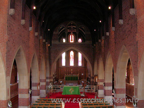 All Saints, Southend-on-Sea  Church - This photo shows the view from the W gallery, looking towards 
the chancel. Above the chancel arch can be seen a large triple arch, as the 
chancel rises to the same height as the nave.


