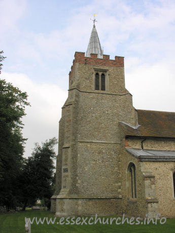 St Mary the Virgin, Henham Church - The tower dates from C14. It has diagonal buttresses, which extend into the nave, underpinned by a squinch. The brick battlements are later, as is the lead 'spike' spire.