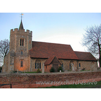 St Peter & St Paul, Hockley Church – Exterior 3: These pictures were taken on 28th December 2003, just as the light was beginning to fade. The floodlights had just come on, as can be seen at the base of the tower. The majority of this church dates from C13, with the exception of the ogee-headed W doorway, visible in the next image, which was as a result of the 1842 restoration.