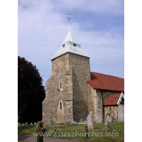 St Mary the Virgin, North Shoebury Church – Exterior 3: This lower parts of the tower are C13, as is shown by the west windows. Later, the buttresses were added, and a two-step pyramid roof was added, the upper part broached.