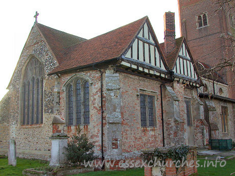 St Andrew, Rochford Church – The chancel chapel is of red brick, with half-timbered gables.