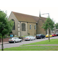 Holy Trinity, Southchurch Church – Exterior 4: The original Norman south doorway, now protected from the elements by a wooden porch.