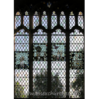 St John the Baptist, Thaxted Church – Stained Glass 1: This stained glass window (and the following four enlargements of the panels within it) depicts Adam and Eve. The original glass in the panels dates from C15.