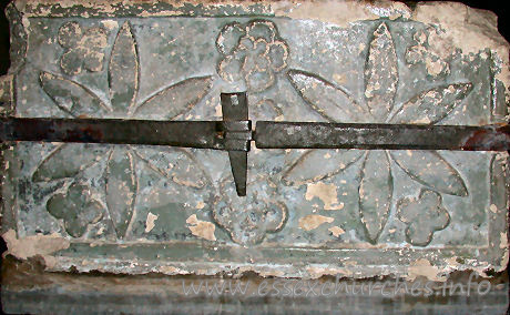 St Edmund, Abbess Roding Church – This side of the font shows two flowers and three small roses, along with four smaller flowers in each corner.