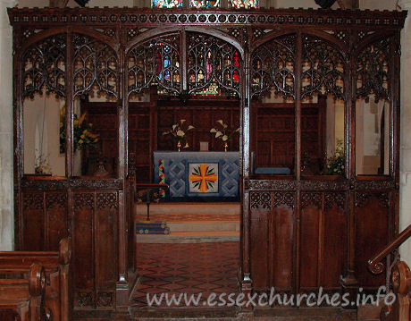 St Edmund, Abbess Roding Church – The screen has two-light divisions. The mullion is carried up into the apex of the four-centred arch. Each light consists of panel-tracery with an ogee arch below.