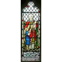 St Catherine, Wickford Church – Stained Glass 5: This window depicts Mary and the baby Jesus. It is dedicated to Constance Burton, who was the wife of a Conservative MP from Sudbury, named Colonel H.W. Burton OBE. The banner at the bottom of the window reads ... "Her children arise up and call her blessed."