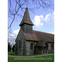 St Mary, Broxted Church – Exterior 3: The belfry is weatherboarded, and stands on four posts.