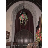 St Peter, Paglesham Church – Interior 6: At one time, there was, beneath this tower arch, a gallery for singers. The tower arch is supported by half-octagonal responds with moulded capitals and bases.