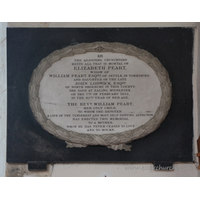 St Nicholas, Great Wakering Church – Monument 2: In the adjoining churchyard rests all that is mortal of Elizabeth Peart, widow of William Peart, Esqre, of Settle in Yorkshire, and daughter of the late John Lodwick, Esqre, of North Shoebury in this county. === She died at Ealing, Middlesex, on the 7th February 1832, in the 65th year of her age. === The Revd William Peart, her only child, to whom she devoted a life of the tenderest and most self-denying affection, has erected this memorial to a mother whom he has never ceased to love and to mourn.