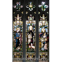 St Mary the Virgin, Great Bardfield Church – Stained Glass 11: Chancel N wall - Three Girl Saints. St Margaret, St Agnes & St Cecilia. In memory of Adela Minna Lampet, who died, aged 13 years on November 14th 1873.