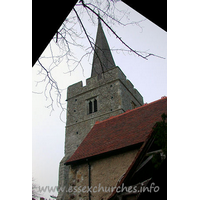 St Mary Magdalene, Great Burstead Church – Exterior 6: The 14th century W tower, with angle buttresses has a tall timber spire.
