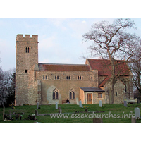St Nicholas, Rawreth Church – Exterior 2: This view from the south shows the mismatch of the different parts of the church. One would perhaps expect that it was the chancel that was built at a different time to the nave, but in fact, both were built in 1882. The only exceptions to this date are the tower, the S aisle and (not shown) the W wall of the N aisle. My lovely Julie poses for us once again in front of the nave.