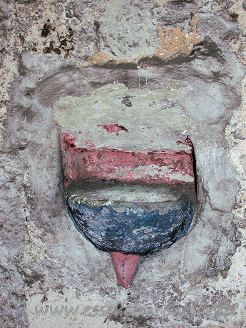 St Mary, Runwell Church – Even the stoup did not escape the 'painting rector'.