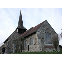 St Nicholas, Laindon Church – Exterior 1: This view shows, in addition to Julie, the C14 chancel and S chapel. The church was open when we arrived, but a christening was taking place. As this was visited in January, the days were rather short, so we didn't waste time waiting for it to finish.