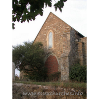 St Catherine, East Tilbury Church – Exterior 5: The east wall, showing the tower arch from the original C13 tower. It is said that this tower was destroyed during a Dutch raid in 1667, though this theory has often been challenged.