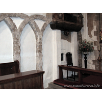 St Mary Magdalene, East Ham Church – Interior 4: The north nave wall. Note the glazed aperture to the left of the chair. This is the anchorite's cell.