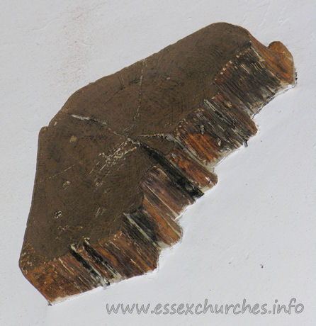 All Saints, Nazeing Church – The remains of the upper front part of the rood screen. Evidently just hacked off, and left embedded in the S wall.