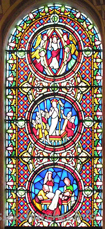 St Michael & All Angels, Copford Church – The nave N window, just to the left of the chancel arch.