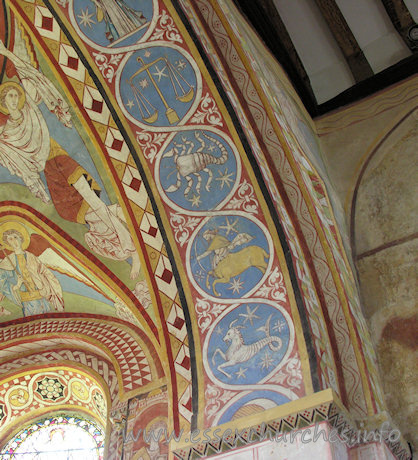 St Michael & All Angels, Copford Church – The right-most part of the underneath of the chancel arch, which depicts all 12 signs of the zodiac. From top to bottom can be seen: Libra, Scorpio, Sagittarius and Capricorn.