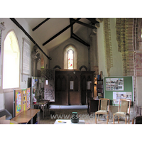 St Michael & All Angels, Copford Church – Interior 20: Looking W in the S aisle. The difference in the brick styles can be seen clearly here, with the Roman bricks to the left, and the home-made or imported bricks to the right.