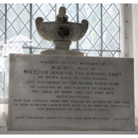 St Mary & All Saints, Lambourne Church – Monument 14: Sacred to the memory of Rachel, wife of William Joseph Lockwood Esq. of Dews Hall in this parish and daughter of Sir Mark Wood, Baronet of Gatton in the county of Surrey. She died at Rome the 25th February 1874 aged 81 years. Her son, anxious that she should be buried by the side of her husband, caused her body to be brought to England and deposited in the family vault. "Her children arise up, and call her blessed." Proverbs XXXI.28