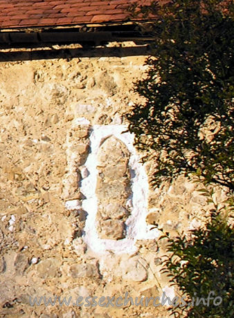 All Saints, Vange Church - The blocked Norman S window as it is today ...
