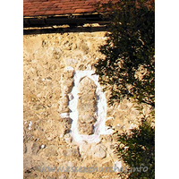 All Saints, Vange Church - The blocked Norman S window as it is today ...
