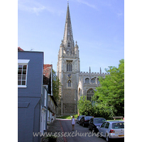 St Mary the Virgin, Saffron Walden Church - Pevsner certainly had a lot to say about this church, and it 
is obvious why, as soon as one navigates the streets around Saffron Walden, to 
be confronted with this beautiful tower and spire. The style of this church is 
clearly East Anglian (Essex has no defined style of it's own - except the 
'borrowed' style).
From Pevsner "... one of the most lavishly designed - in a 
style entirely from across the border, East Anglian, of the Suffolk and even 
more, the Cambridge brand."
Julie poses for us, looking lovely, if rather dwarfed by 
Saffron Walden's fantastic tower.
