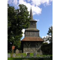 St Laurence, Blackmore Church - Seriously, though, this really is one of the finest, if not the finest timber church tower in the country. This claim is upheld by Pevsner and many others.
The tower consists of a lower storey with three lean-to roofs on each of the N, E and S sides. Directly above is an area of square weatherboarding. Above this, is another storey with four lean-to roofs, followed by what is a more common sight in this county - a square bell stage, topped with a shingled broach spire.
