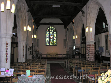 St Laurence, Blackmore Church - The nave. The N aisle is early C14, whilst the S aisle is clearly C16, with it's brick piers. Due to the early dissolvement of this priory (1527), it is unclear as to whether the C16 alterations where as a result of the move to parochial use.