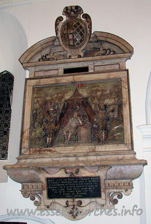 St Margaret, Barking Church - This splendid detail of the monument to Sir Charles Montagu in 
the chancel, is a wonderfully carved depiction of him in his tent in an army 
encampment, with his musketeers by his side.
The inscription below the monument reads:

	
		Heere lieth the Body of Y Worthy Knight
	
	
		S. Charles Montagu; who died at his House
	
	
		at Cranbrook in Essex in the parish of
	
	
		Barking the 11 of September in Y yeere of
	
	
		our Lorde Gpd 1625, being of Y
	
	
		age of 61 yeares, who gave to
	
	
		Y poore of Barking
	
	
		forty pounds
	
