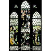 St Mary (Old Church), Frinton-on-Sea Church - Here are four panels of Morris glass, designed by Burne-Jones. 
These are in the early style of the firm, pre-dating the domination of colour 
schemes with peacock blues and greens. Pevsner tells us that the window "is 
said to have come from Melchet Abbey, but was bought at a London sale by a donor 
to the church."