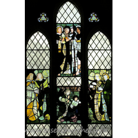 St Mary (Old Church), Frinton-on-Sea Church - Here are four panels of Morris glass, designed by Burne-Jones. 
These are in the early style of the firm, pre-dating the domination of colour 
schemes with peacock blues and greens. Pevsner tells us that the window "is 
said to have come from Melchet Abbey, but was bought at a London sale by a donor 
to the church."