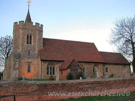 St Peter & St Paul, Hockley Church - These pictures were taken on 28th December 2003, just as the light was beginning to fade. The floodlights had just come on, as can be seen at the base of the tower.

The majority of this church dates from C13, with the exception 
of the ogee-headed W doorway, visible in the next image, which was as a result 
of the 1842 restoration.
