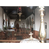 St Peter & St Paul, Hockley Church - This shot of the interior was taken through the east window, looking in above the altar. The four-bay arcade leading into a narrow N aisle can be seen to the right of the picture.

The triangularly-headed door at the W end sits within a ogee-shaped W doorway.