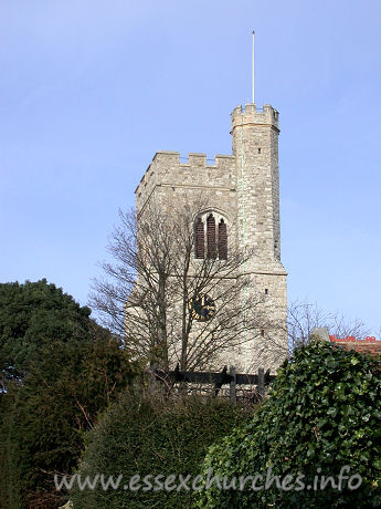 St Clement, Leigh-on-Sea Church - St Clement's church is best approached from Church Hill. It is 
a steep climb, but is well worth it as the church suddenly appears from between 
the trees. Though I doubt this view is possible when that tree is somewhat 
leafier.
The C15 west tower is diagonally buttressed. It has 
battlements, and the raised stair turret can clearly be seen in this picture. 
The tower has a west door, and a three-light west window.
