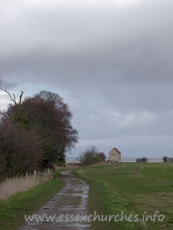 St Peter-on-the-Wall, Bradwell-juxta-Mare  Church - I'd driven out to Bradwell, intending to do quite a few 
churches that day. As I passed Woodham Ferrers, the weather started to turn 
rather dark, and it looked as though I was in for rather a wet day. As I pulled 
up to the car park just before the farm track leading to St Peter's, the weather 
began to brighten up somewhat. This first picture still clearly shows the haze 
that was present near the coast that day, not to mention the mess that had been 
created on the track.
