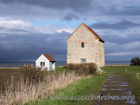 St Peter-on-the-Wall, Bradwell-juxta-Mare  Church - On this approach to St Peter's, the small building to the left 
intrudes into the overall view of the area. St Peter's had been alone for so 
long. Heaven only knows why it was seen fit to build a beach hut (sorry - 
vestry) here in the late 1950s! Sacrilege!
